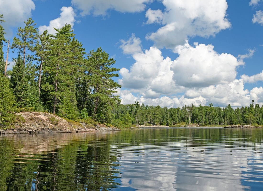 Moose Lake, MN - Puffy Summer Afternoon Clouds Over the North Woods